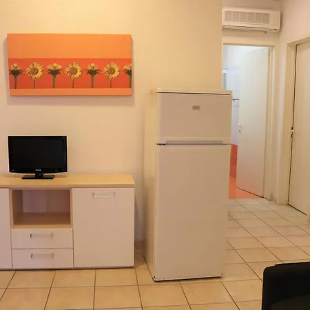 Lägenhet Villaggio Olimpia *